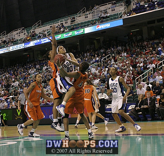 ...but Lindsey Harding charges into Siedah Williams