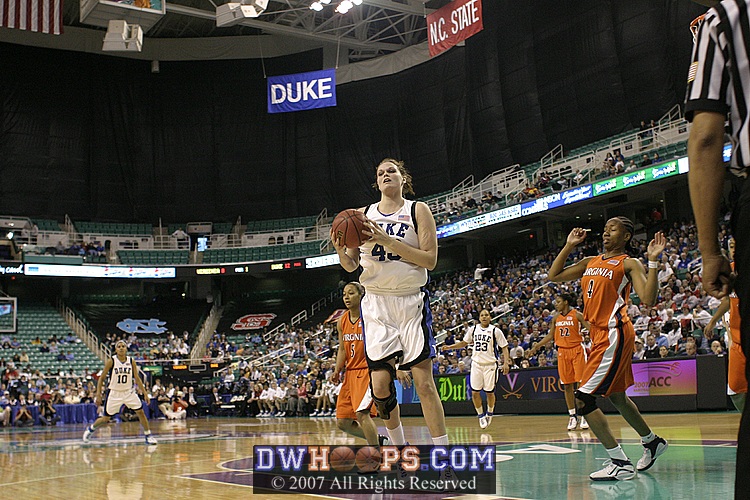 Alison pulls down the board from a Smith miss...