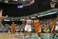 12-8, 13:42 - ...and Nish returns the favor by boarding Ali's miss.  And while this looks like a foul by Monica Wright...