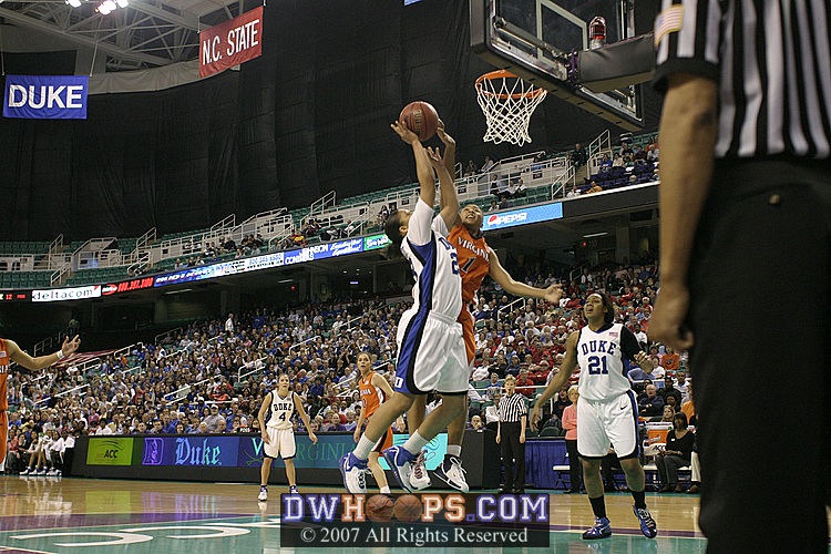 ...the real foul came from Littles as Wanisha drove strong.