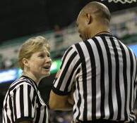 1st half - Veteran officials Sally Bell and Wesley Dean during a media timeout