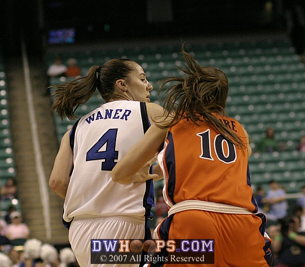 Brenna McGuire closely guards Abby Waner...