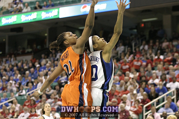 Wright defends this Harding layup