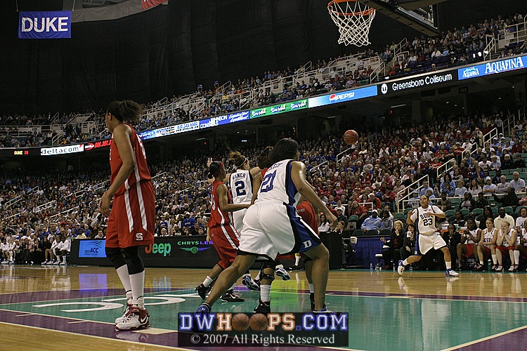 Emily Waner kicks it out to Wanisha Smith...