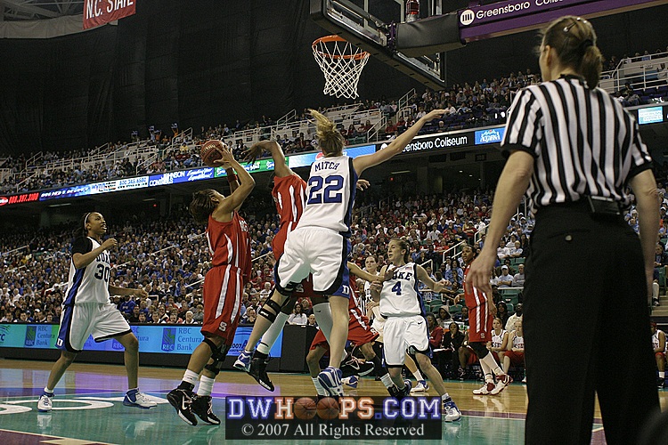 Whittington rebounds a Bales miss.  Neither team has scored a basket for nearly 3 minutes.