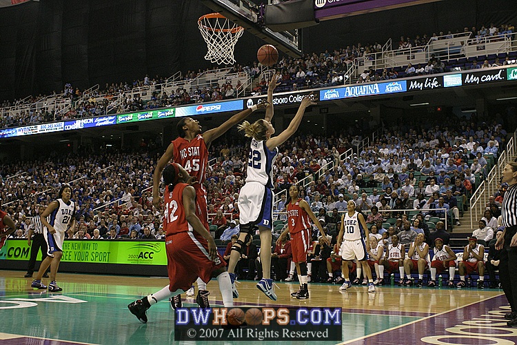 ...she tries the reverse layup...