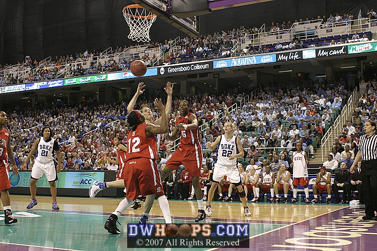 ...but missed, rebound Shayla Fields.