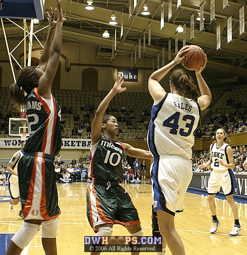 Emily Waner calls for the ball as Alison Bales is doubleteamed in the post