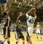 Emily Waner calls for the ball as Alison Bales is doubleteamed in the post