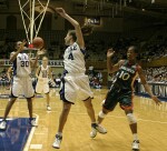 Abby Waner makes the acrobatic pass to Carrem Gay...