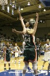 ...then twists for the shot.