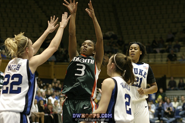 Renee Taylor takes a shot over Brittany Mitch