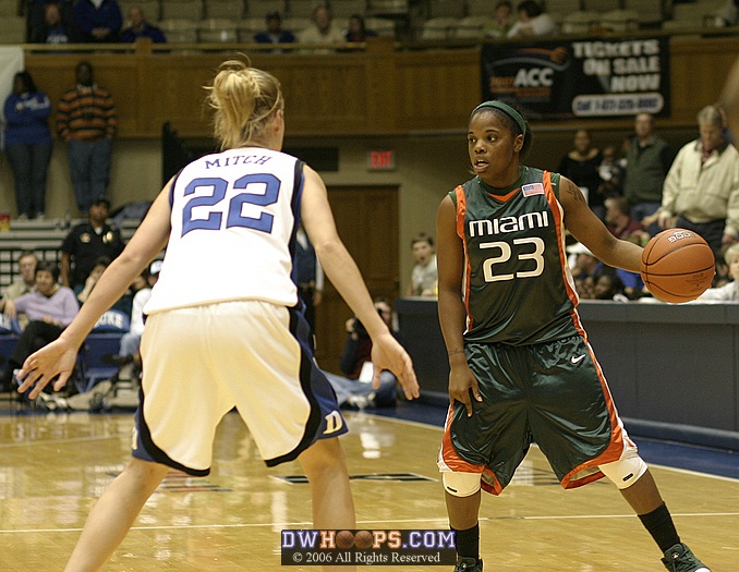 Brittany Mitch guards Latoya Cunningham in the closing seconds of another Duke victory