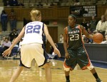 Brittany Mitch guards Latoya Cunningham in the closing seconds of another Duke victory