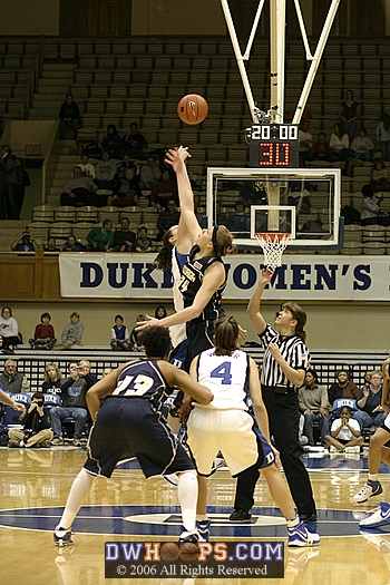 Alison Bales and Georgia Tech's Brigitte Ardossi battle for Tina Napier's toss