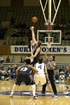 Alison Bales and Georgia Tech's Brigitte Ardossi battle for Tina Napier's toss