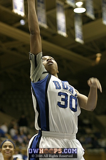Carrem Gay watches her layup roll out early in the first half
