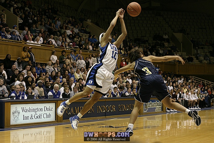 Lindsey Harding is airborne over Tech's Stephanie Higgs
