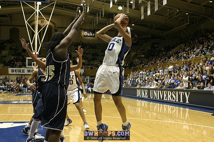 Lindsey Harding goes up for a jumper, starting a sequence of 4 consecutive Blue Devil offensive rebounds