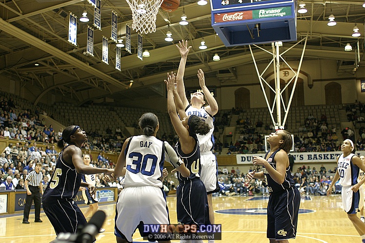 Alison Bales attempts to follow the Harding miss