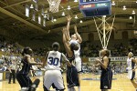 Alison Bales attempts to follow the Harding miss