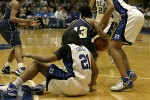 Struggle for a loose ball at Duke's end