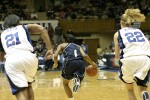 After rebounding a rare Abby Waner miss, Jacqua Williams speeds downcourt...