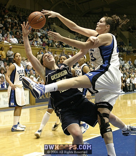 Alison Bales is whistled for the foul while attempting to block Brigitte Ardosi.  She finished the night with 6 blocks, extending her ACC record.