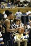 Official Tina Napier blows the whistle as Stephanie Higgs gives a sheepish grin - 5 Tech players were ready for the pass, but none was there to deliver it.