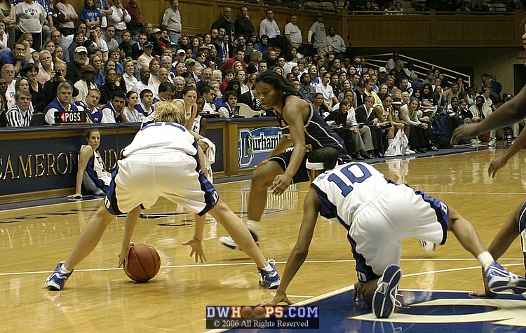 Brittany Mitch gets a defensive rebound off the floor (1 of 2)