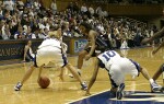 Brittany Mitch gets a defensive rebound off the floor (1 of 2)
