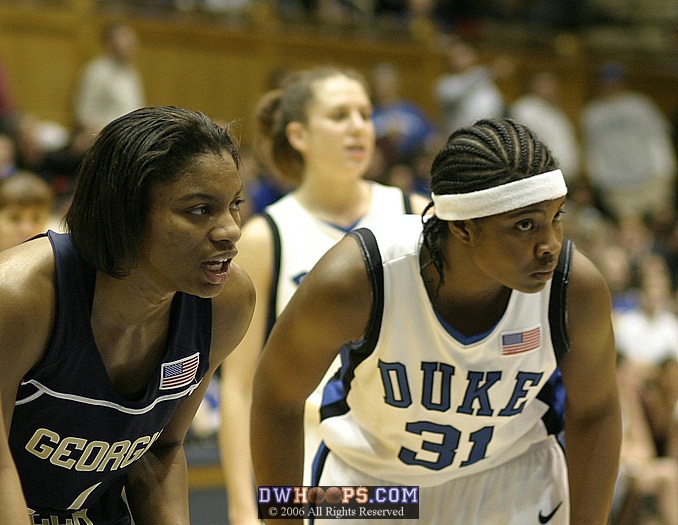 Jacqua Williams and Keturah Jackson await the Jacket free throw