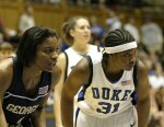 Jacqua Williams and Keturah Jackson await the Jacket free throw