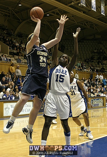With a 34 point lead and a minute to play, Bridgette Mitchell avoids fouling Brigette Ardossi on the layup