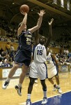 With a 34 point lead and a minute to play, Bridgette Mitchell avoids fouling Brigette Ardossi on the layup