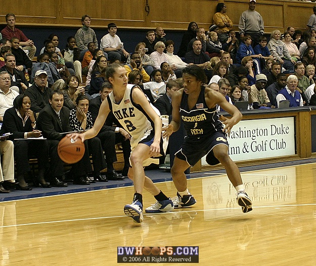 Jacqua Williams applies pressure as Emily Waner dribbles out the clock.