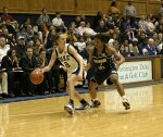 Jacqua Williams applies pressure as Emily Waner dribbles out the clock.