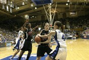 ...and Maryland's Shay Doron is there for the rebound