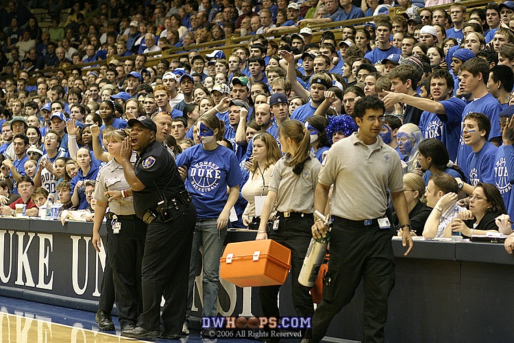 An ill Duke student was helped from the stands during the first half
