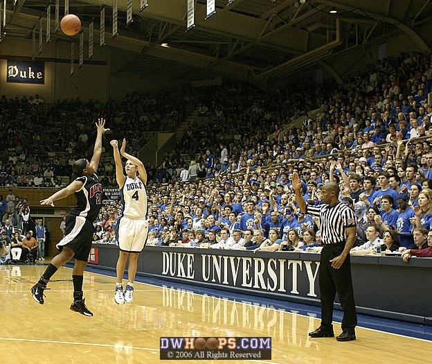 With the shot clock winding down, Abby Waner attempts a 3 point shot