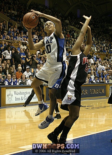 Lindsey Harding is fouled by Maryland's Ashleigh Newman