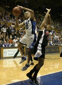 Lindsey Harding is fouled by Maryland's Ashleigh Newman