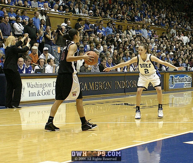 Emily Waner takes a defensive stance against Kristi Toliver, as Brenda Frese calls out the Terp offense