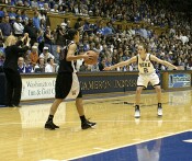 Emily Waner takes a defensive stance against Kristi Toliver, as Brenda Frese calls out the Terp offense
