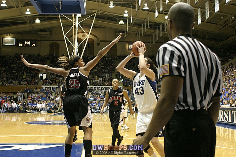 Marissa Coleman defends an Alison Bales jumper