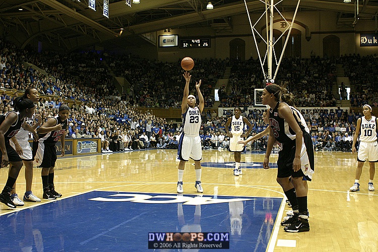 Wanisha Smith completes the three-point play.