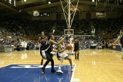 Sa'de Wiley-Gatewood can't prevent a Lindsey Harding layup (1 of 2)