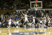 Alison Bales grabs the rebound after blocking Kristi Toliver, one of her five first half blocks.