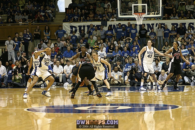 Carrem Gay rotates on defense, shortly before blocking Laura Harper's jumper.