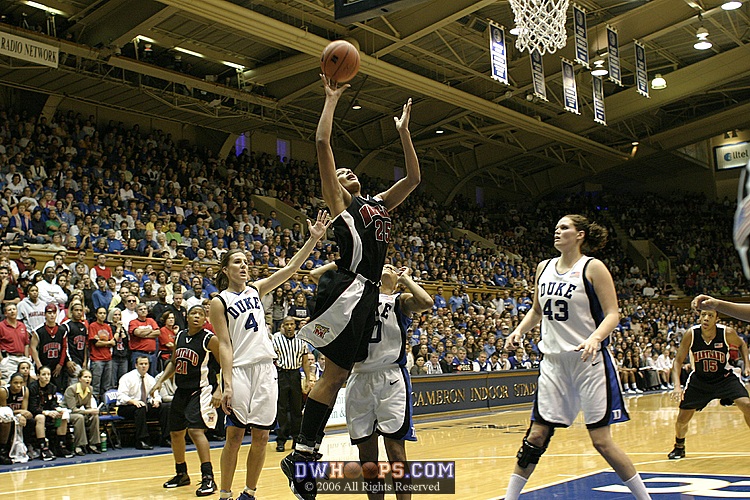 Marissa Coleman soars in to make the layup